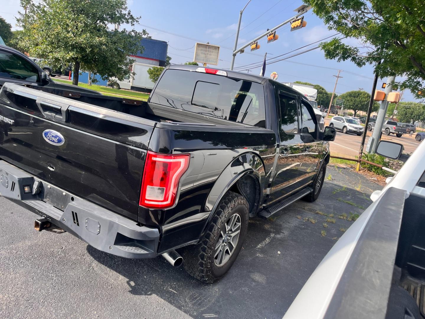 2015 Black Ford F-150 XLT SuperCrew 6.5-ft. Bed 4WD (1FTEW1EG3FK) with an 3.5L V6 TURBO engine, 6-Speed Automatic transmission, located at 945 E. Jefferson Blvd, Dallas, TX, 75203, (214) 943-7777, 32.752514, -96.811630 - Photo#1